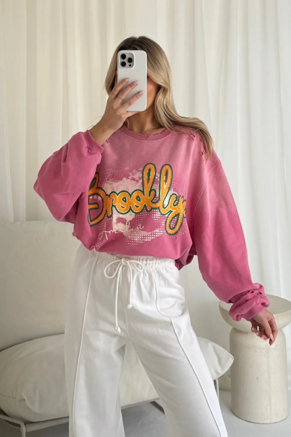 Brooklyn pink printed distressed sweater